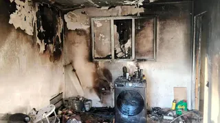 Пожарные спасли девочку из горящей квартиры в Чувашии, оставленную матерью у работающей сушильной машины